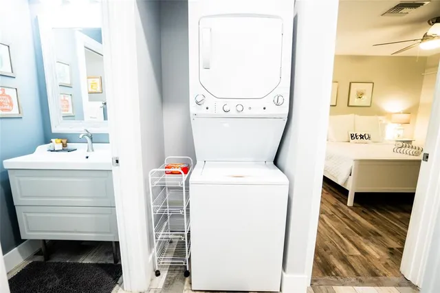 a view of a house with potted plants