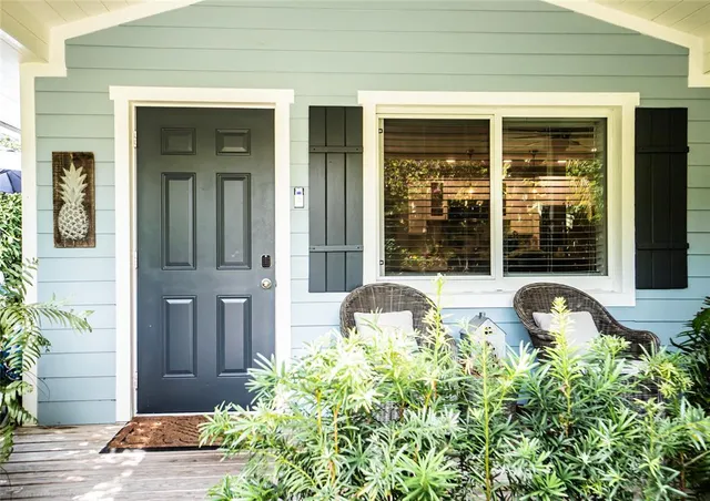 a bed room with a bed and a night stand
