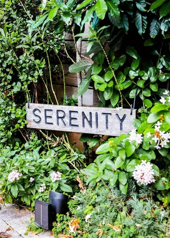 a stove top oven sitting inside of a kitchen