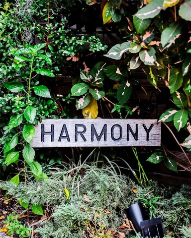 a spacious bedroom with a bed and a table in it