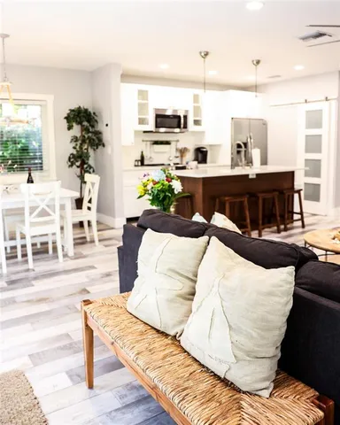 a living room with furniture and a window
