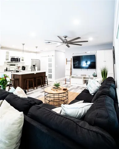 a bathroom with a mirror and a shower