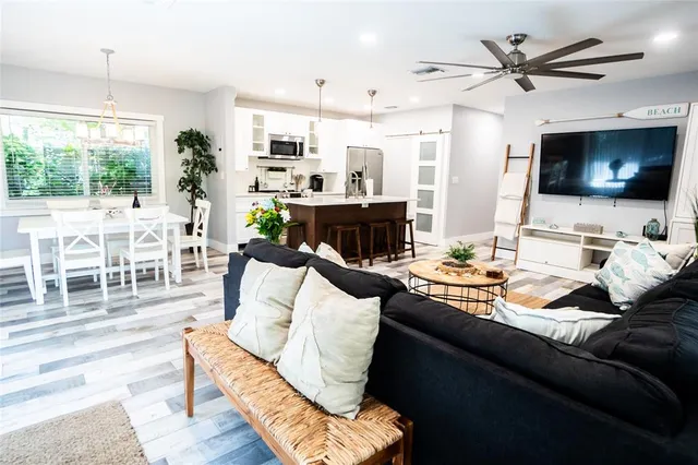 a bathroom with a sink a mirror and a window