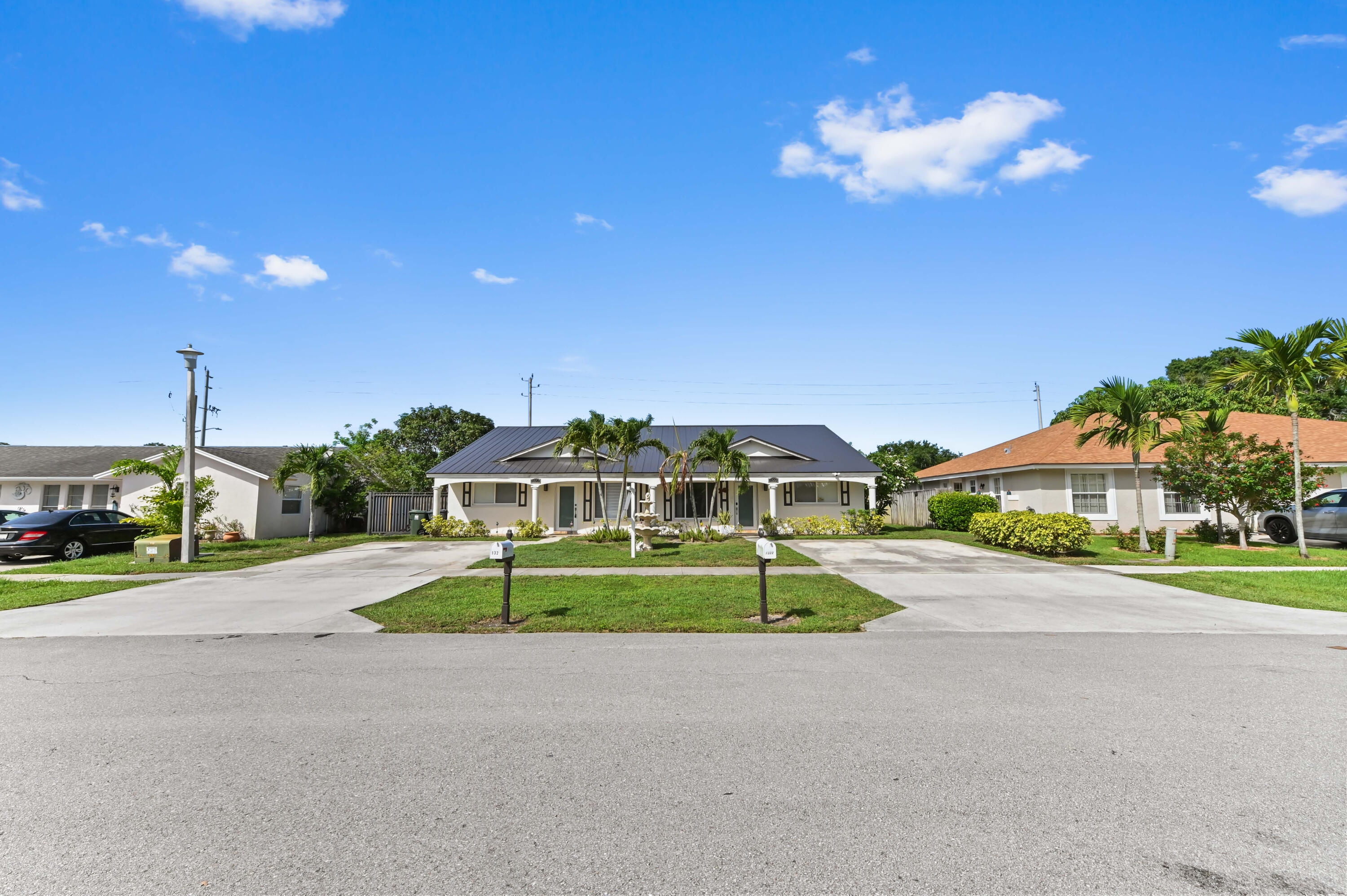 1320 Riverside Circle Wellington, FL 33414 - Photo 1 of 46 01 Front 01