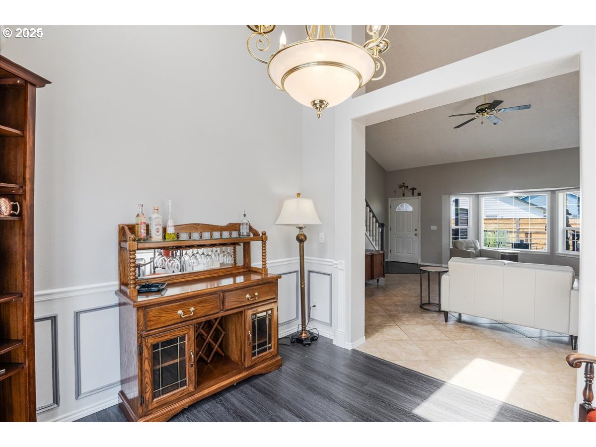 3253 Southeast 24th Terrace Gresham, OR 97080 - Photo 11 of 43 a living room with furniture and a wooden floor