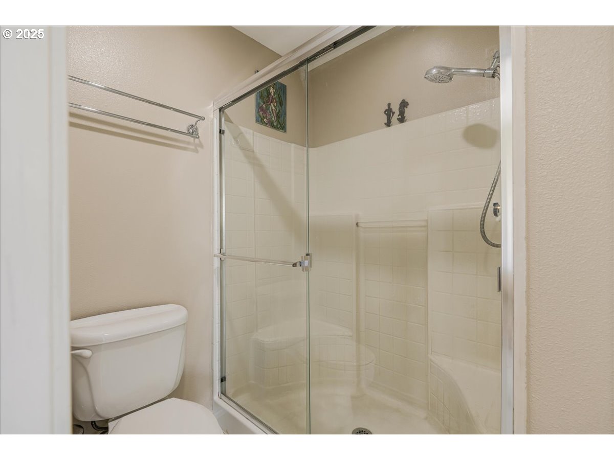 3253 Southeast 24th Terrace Gresham, OR 97080 - Photo 28 of 43 a bathroom with a toilet and a shower