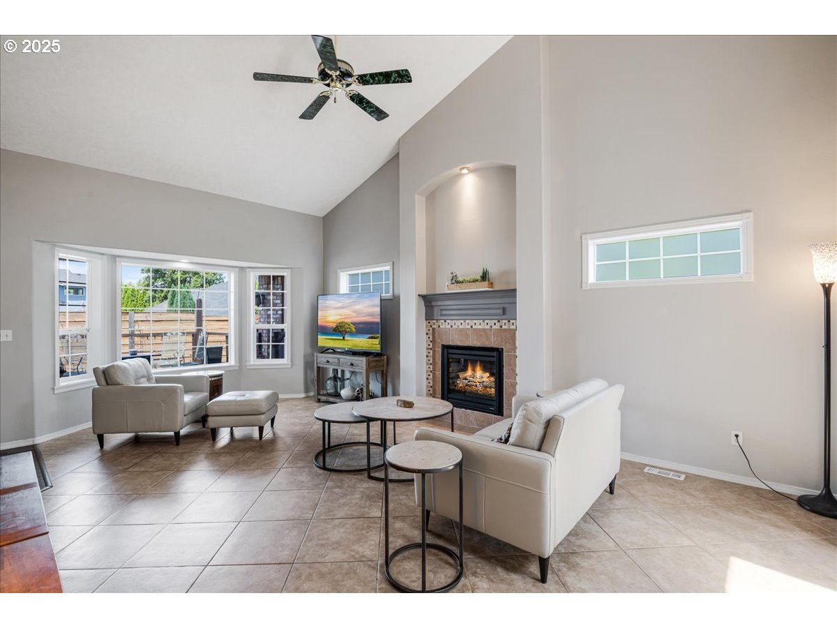 3253 Southeast 24th Terrace Gresham, OR 97080 - Photo 7 of 43 a living room with furniture and a fireplace