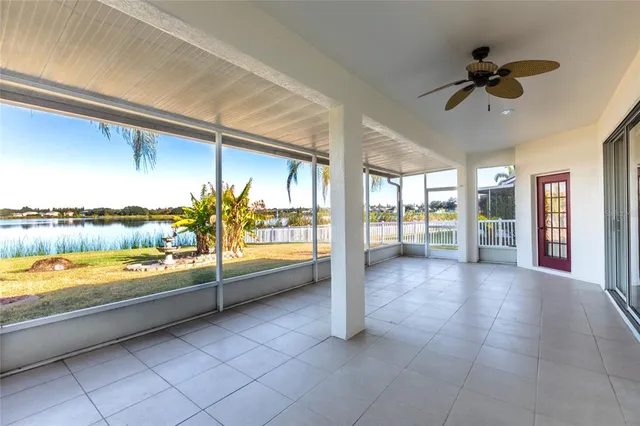a view of an entryway with a ceiling fan