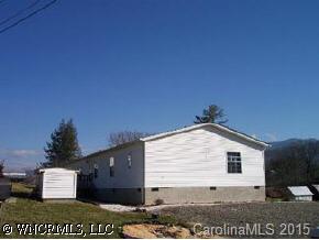 207 Keeter Road Waynesville, NC 28786 - Photo 5 of 8 a view of a house with a yard