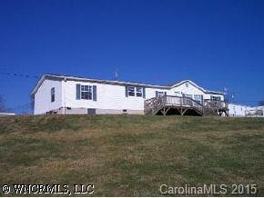 207 Keeter Road Waynesville, NC 28786 - Photo 8 of 8 a view of a big house with a big yard