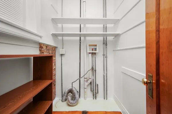 a view of storage and utility room