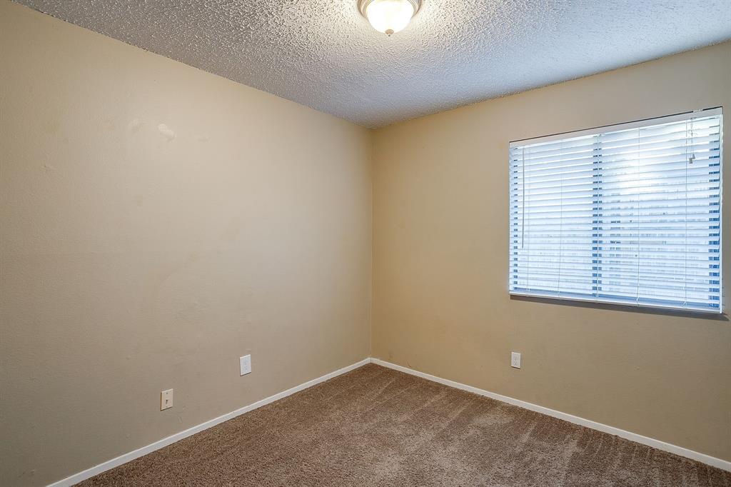 1906 Beacon Way Fort Worth, TX 76140 - Photo 14 of 36 an empty room with a window