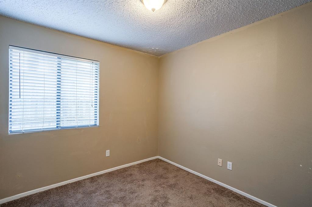 1906 Beacon Way Fort Worth, TX 76140 - Photo 17 of 36 an empty room with a window