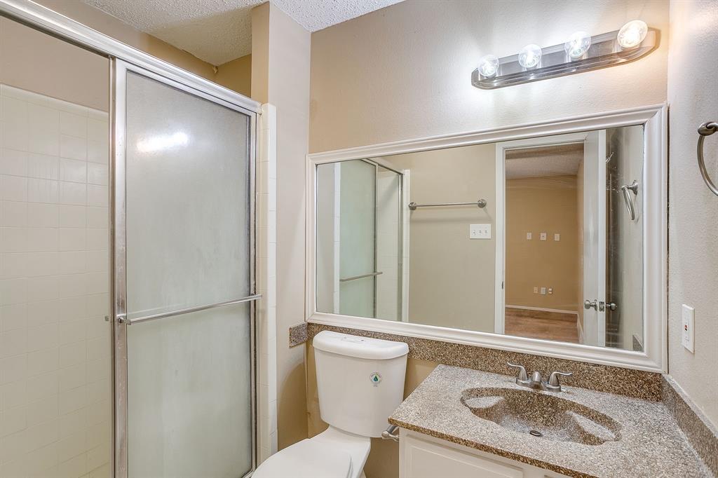 1906 Beacon Way Fort Worth, TX 76140 - Photo 26 of 36 a bathroom with a sink toilet and shower