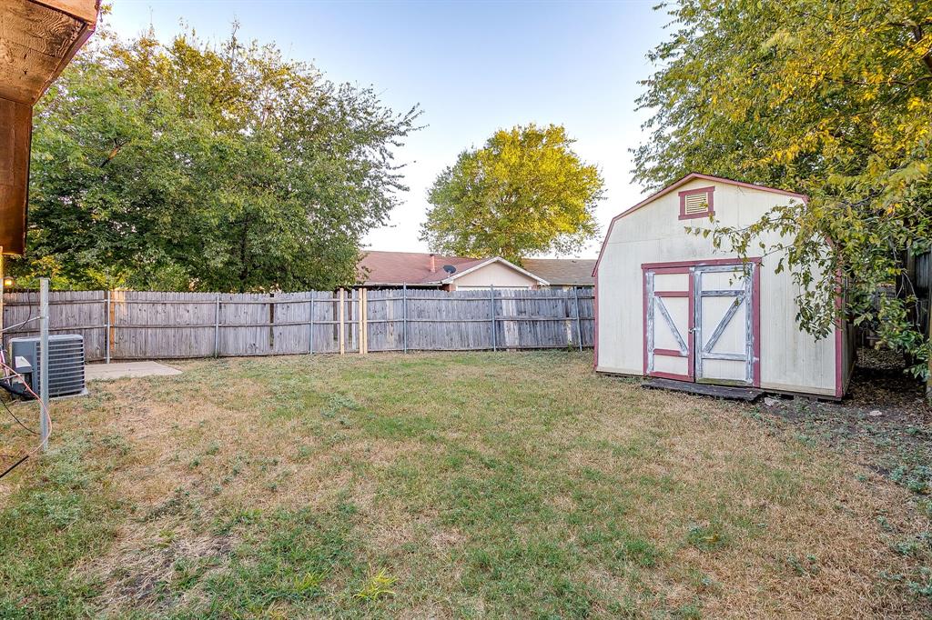 1906 Beacon Way Fort Worth, TX 76140 - Photo 28 of 36 a house with trees in the background