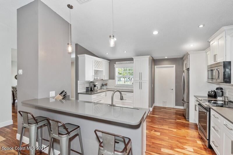 6023 Elgin Road Cocoa, FL 32927 - Photo 3 of 15 Remodeled kitchen with Quartz