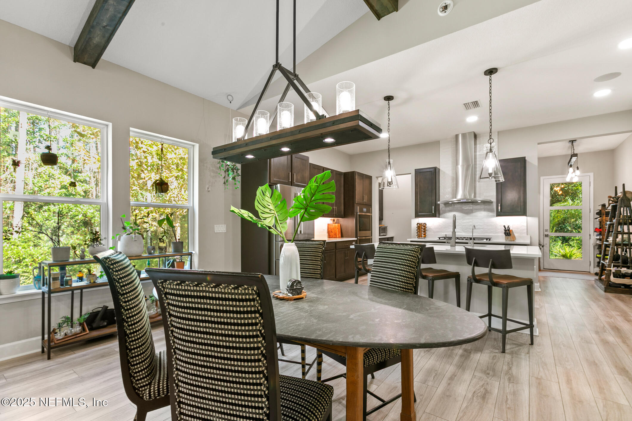 11080 Engineering Way Jacksonville, FL 32256 - Photo 18 of 74 a view of a dining room with furniture window and outside view