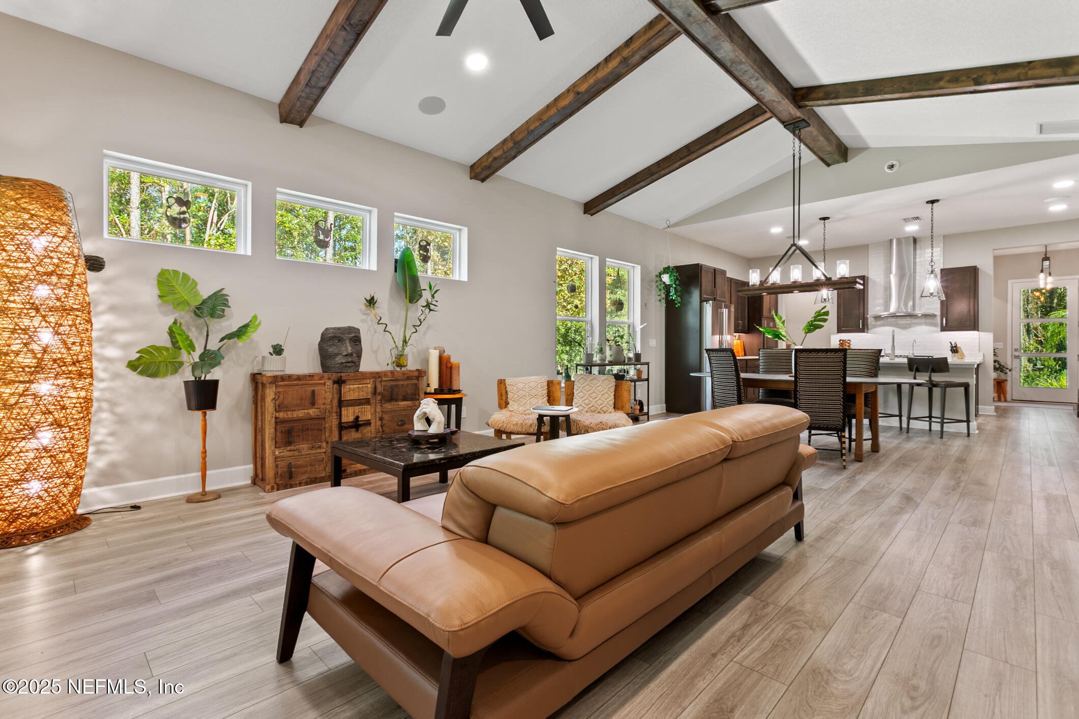11080 Engineering Way Jacksonville, FL 32256 - Photo 20 of 74 a living room with furniture and wooden floor