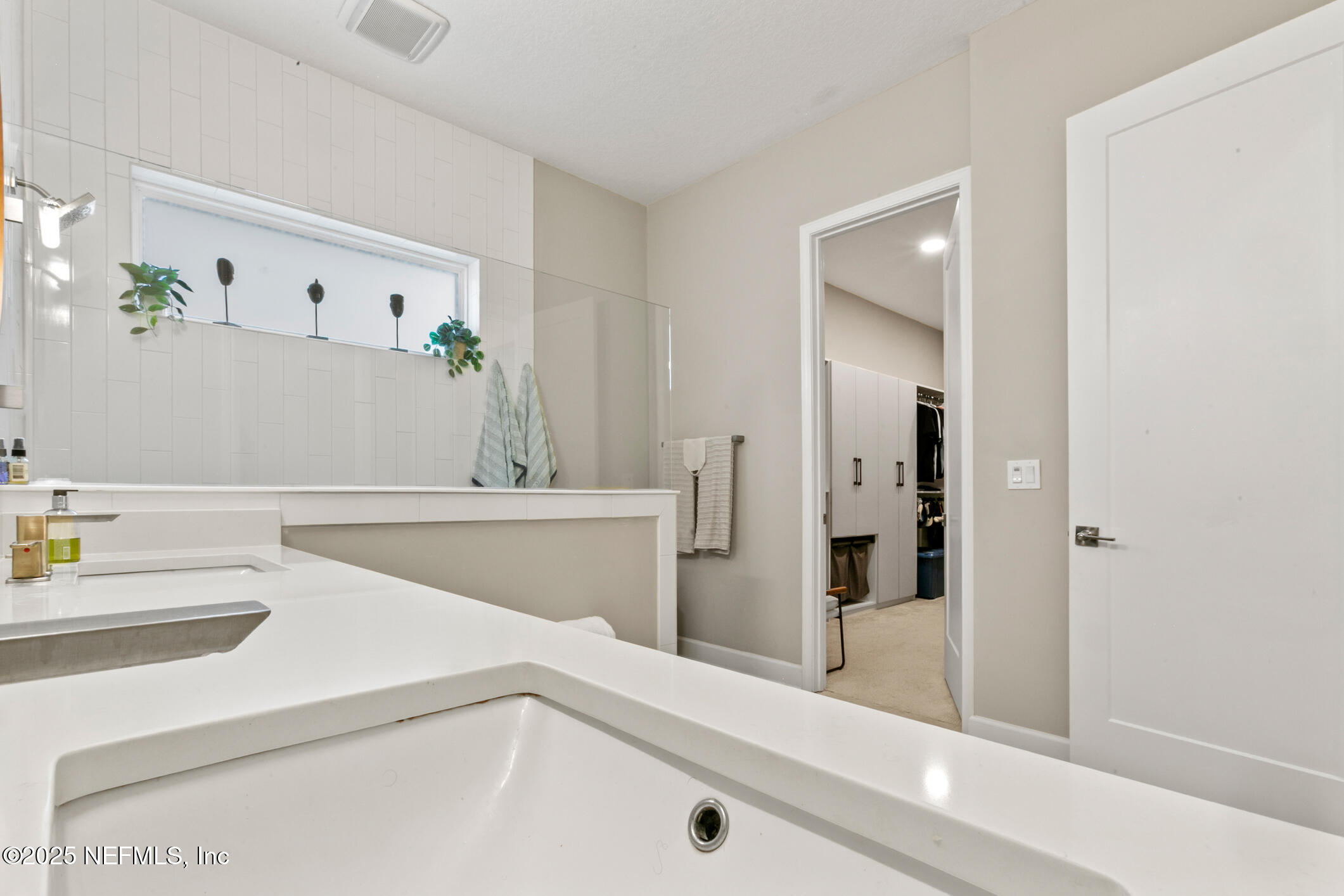 11080 Engineering Way Jacksonville, FL 32256 - Photo 30 of 74 a bathroom with a bathtub and a sink