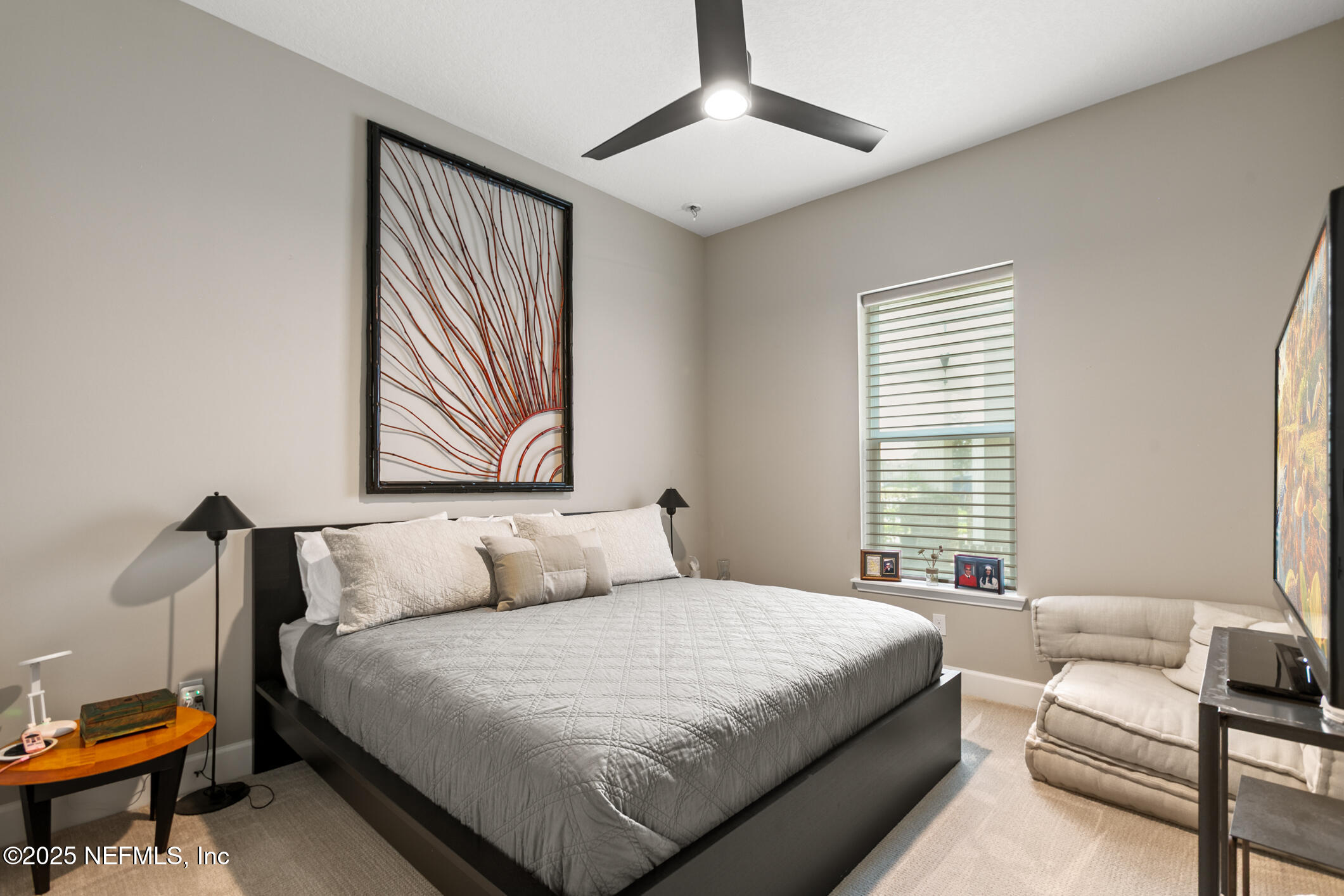 11080 Engineering Way Jacksonville, FL 32256 - Photo 34 of 74 a bedroom with a bed and a couch