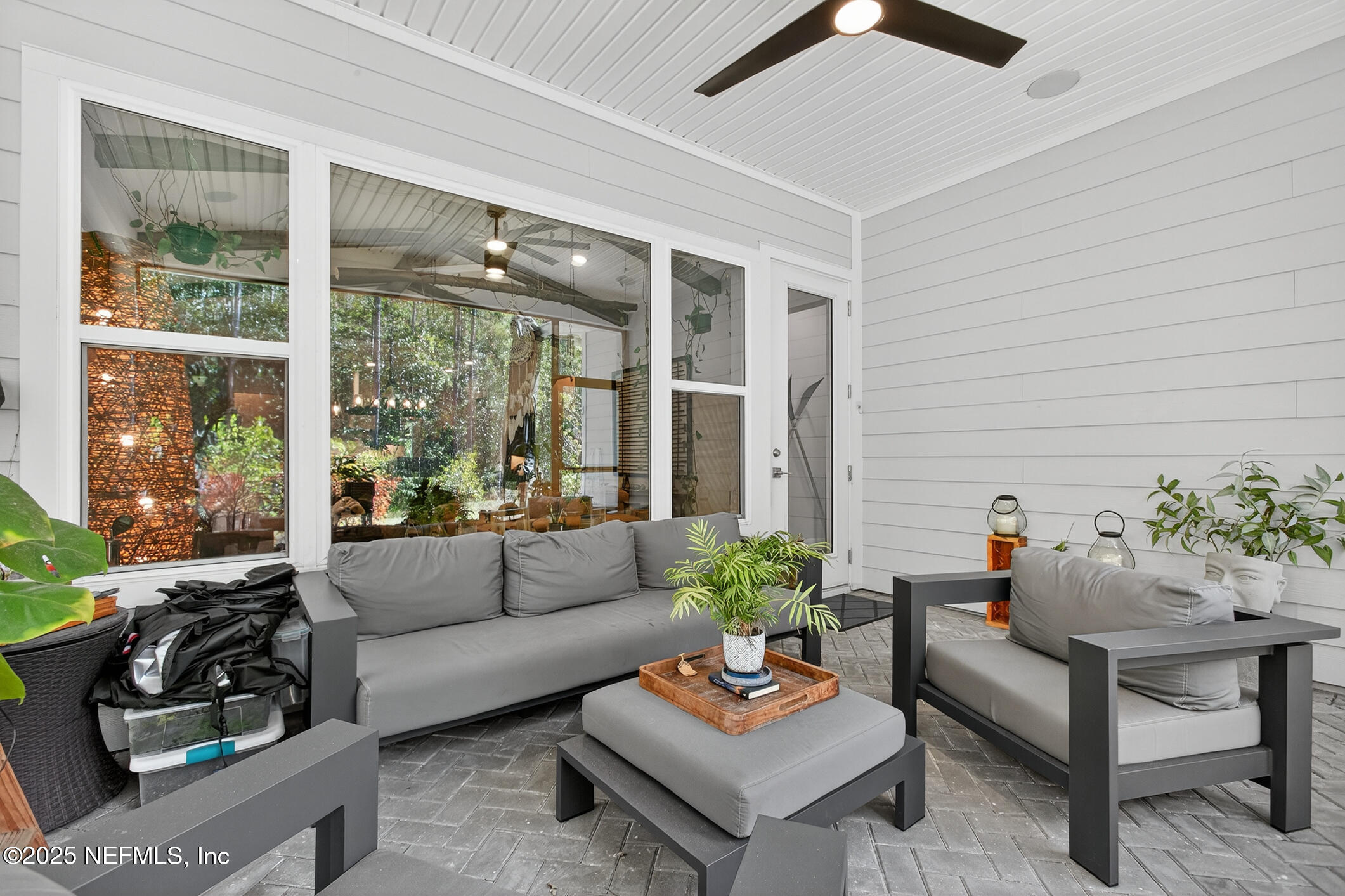 11080 Engineering Way Jacksonville, FL 32256 - Photo 43 of 74 a living room with furniture and a potted plant