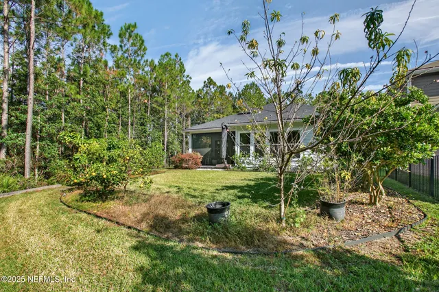 a view of swimming pool with outdoor seating and deck