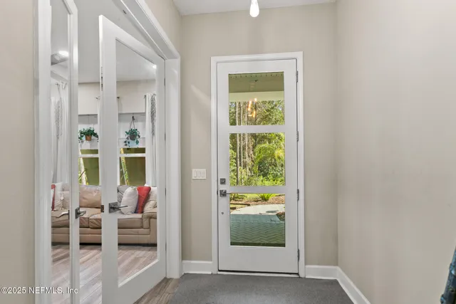 a white stove top oven sitting inside of a kitchen