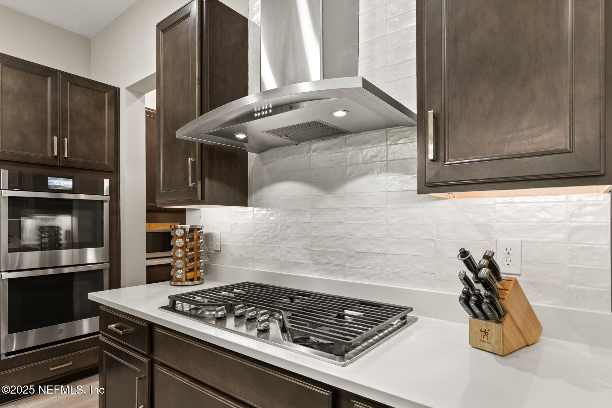11080 Engineering Way Jacksonville, FL 32256 - Photo 10 of 74 a white stove top oven sitting inside of a kitchen