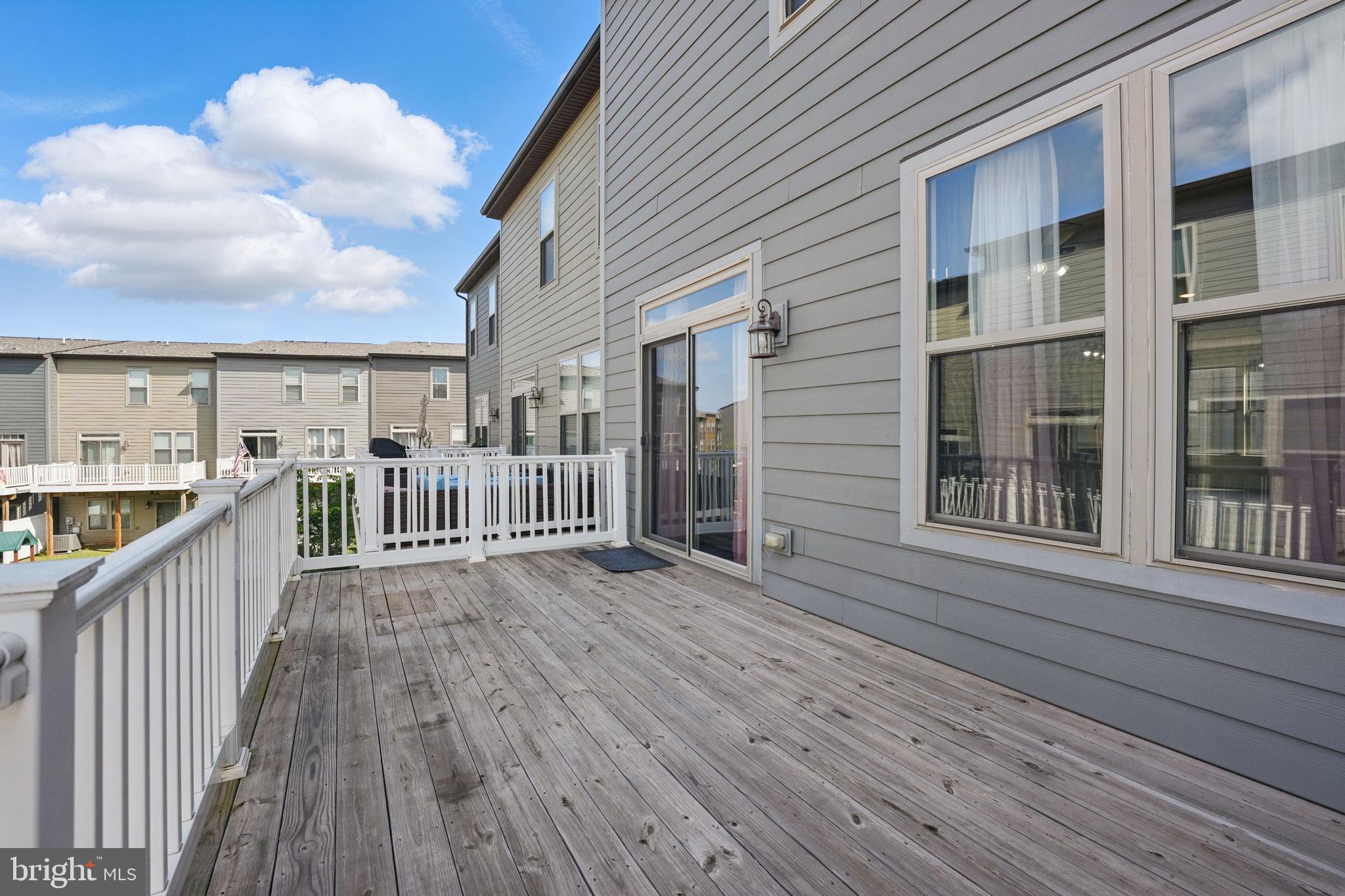 9870 Buchanan Loop Manassas, VA 20110 - Photo 14 of 41 a view of a house with wooden deck