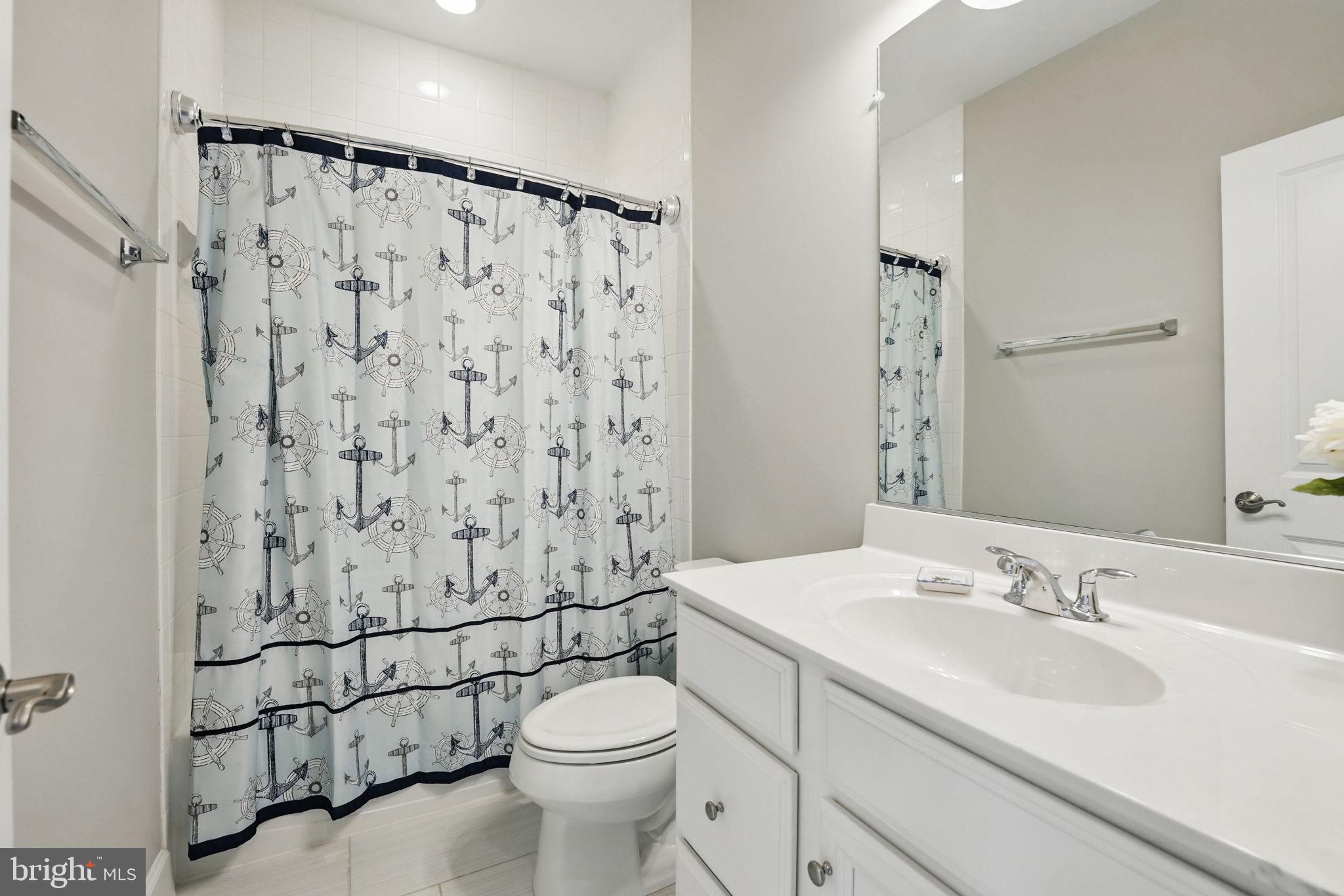 9870 Buchanan Loop Manassas, VA 20110 - Photo 22 of 41 a bathroom with a sink toilet and shower
