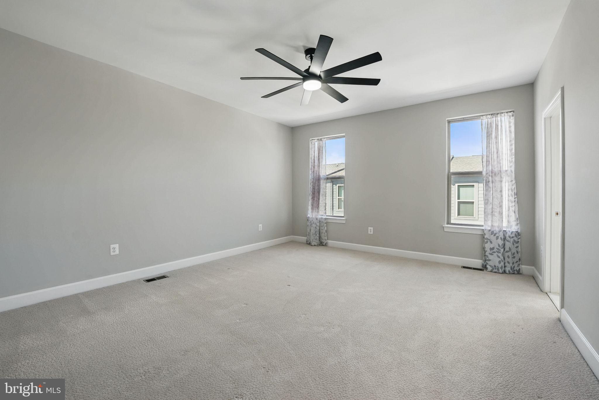 9870 Buchanan Loop Manassas, VA 20110 - Photo 23 of 41 a view of an empty room with a window