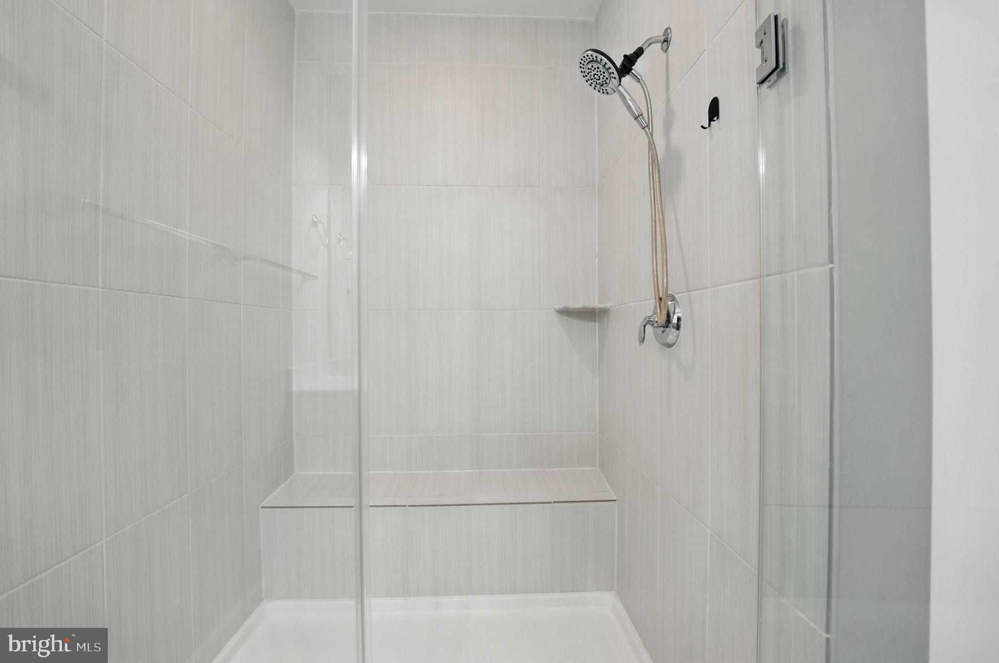 9870 Buchanan Loop Manassas, VA 20110 - Photo 28 of 41 a bathroom with a shower