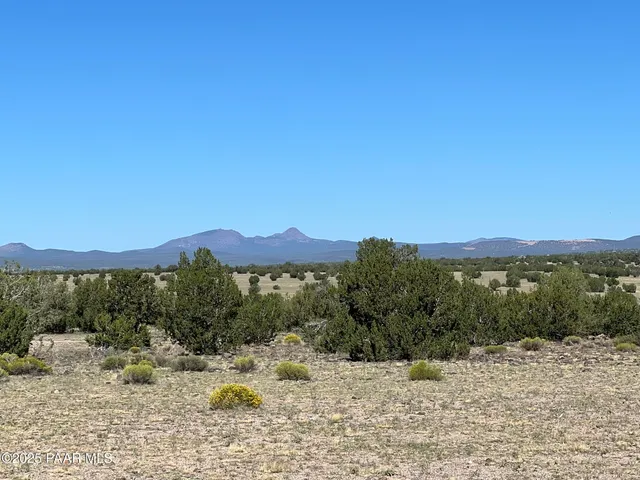 a view of a mountain with a outdoor space