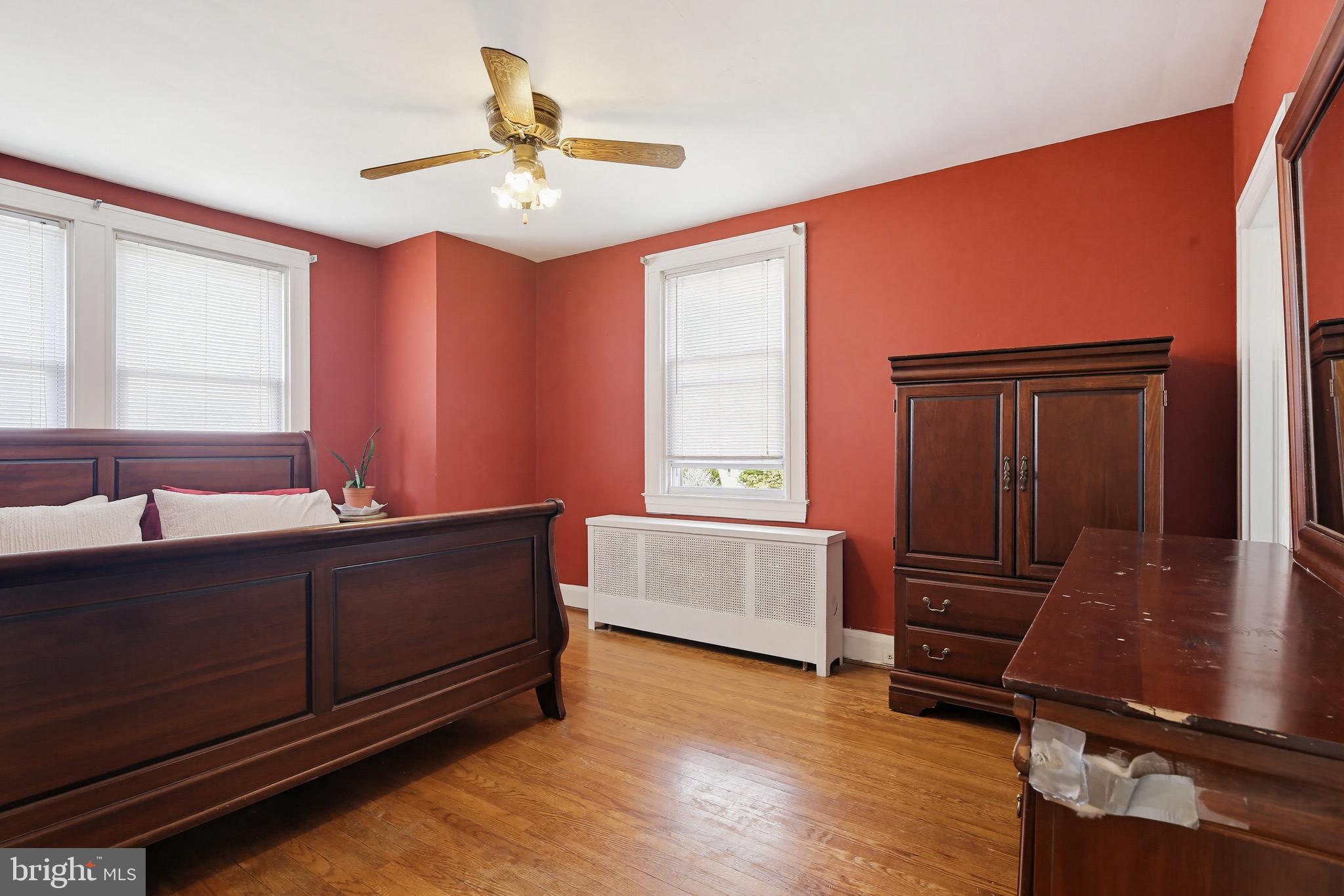 705 Winans Way Baltimore, MD 21229 - Photo 17 of 43 Large bedroom classic hardwood floors