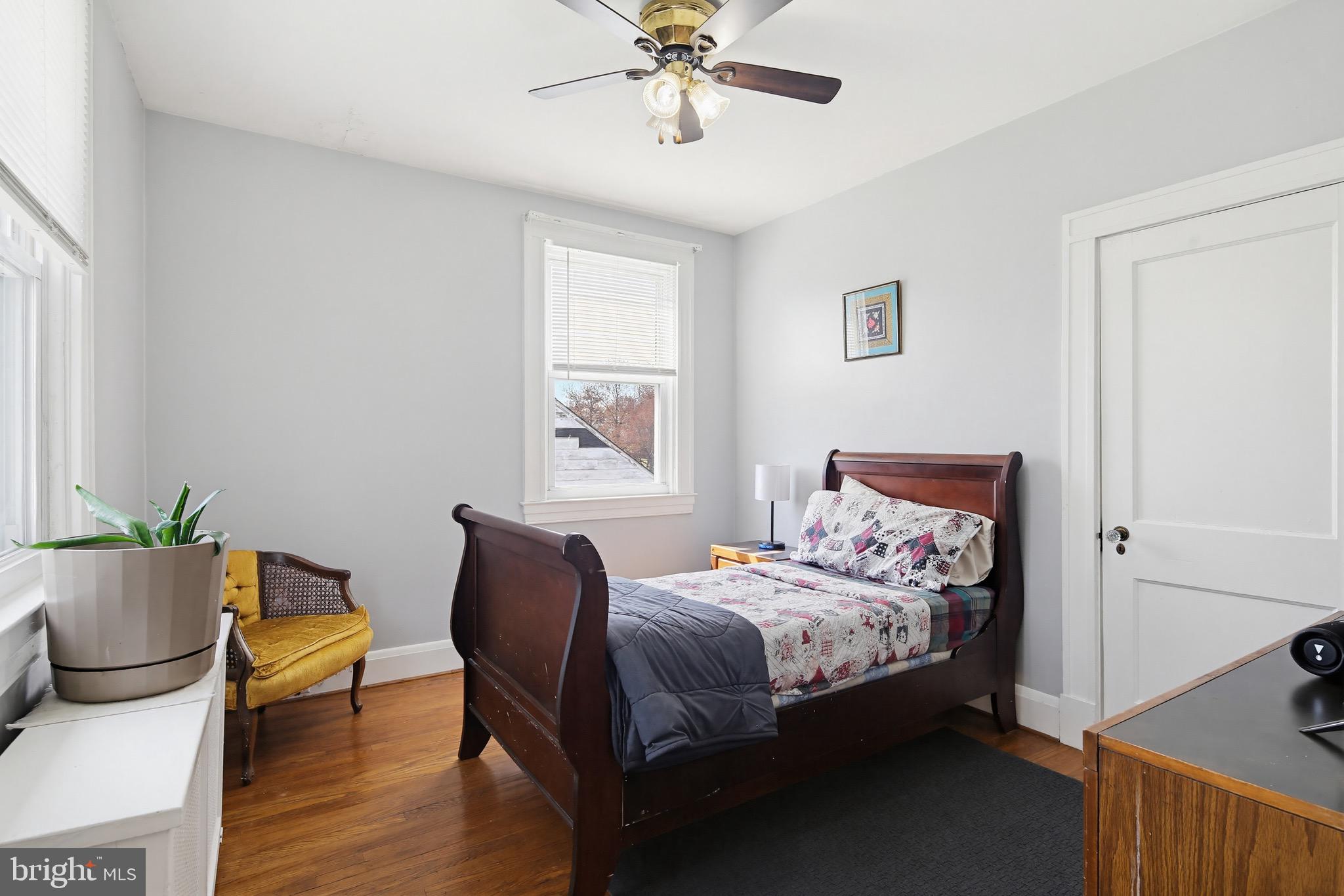 705 Winans Way Baltimore, MD 21229 - Photo 24 of 43 Bedroom with neutral paint and hardwood floors
