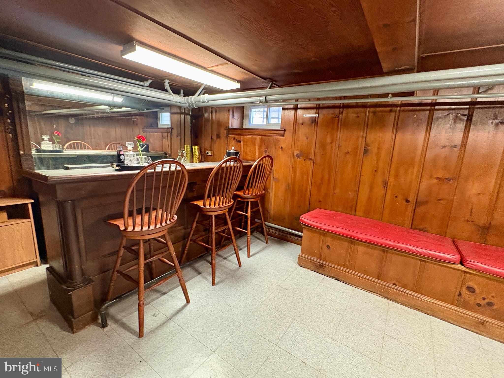705 Winans Way Baltimore, MD 21229 - Photo 26 of 43 Finished basement with retro bar charm