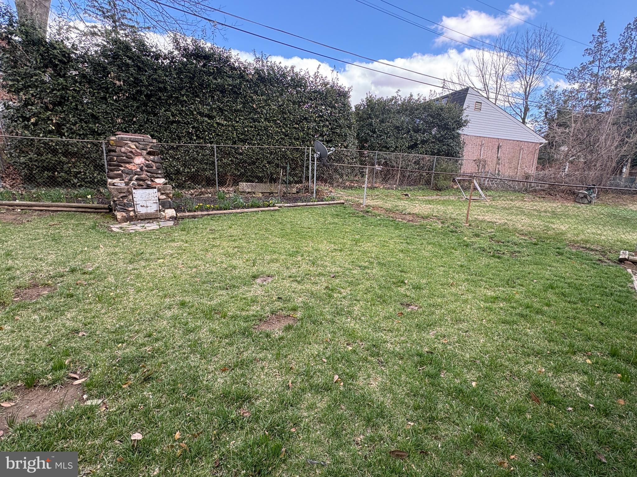 705 Winans Way Baltimore, MD 21229 - Photo 3 of 43 Level backyard ideal for outdoor enjoyment