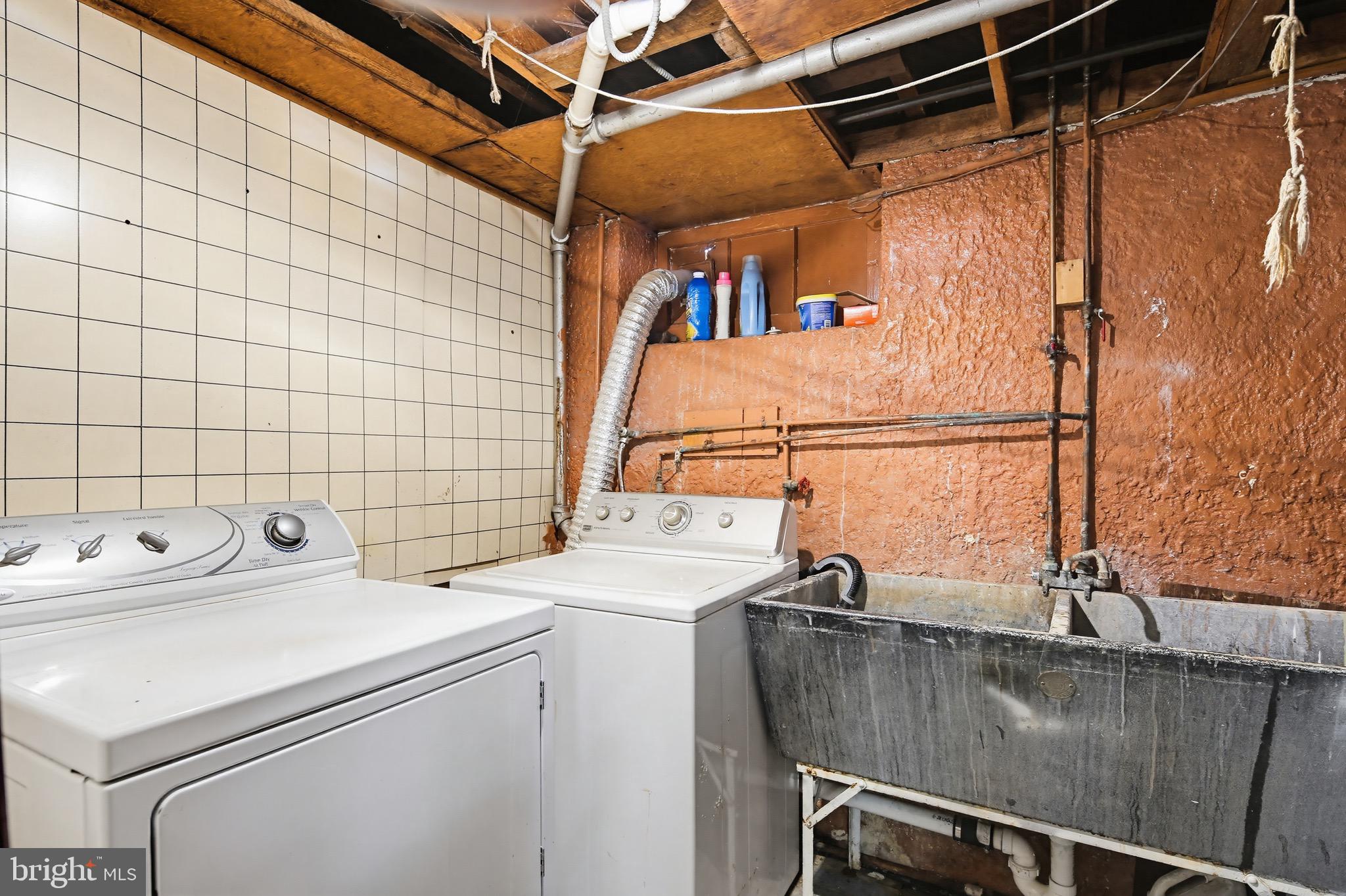 705 Winans Way Baltimore, MD 21229 - Photo 32 of 43 Basement laundry room