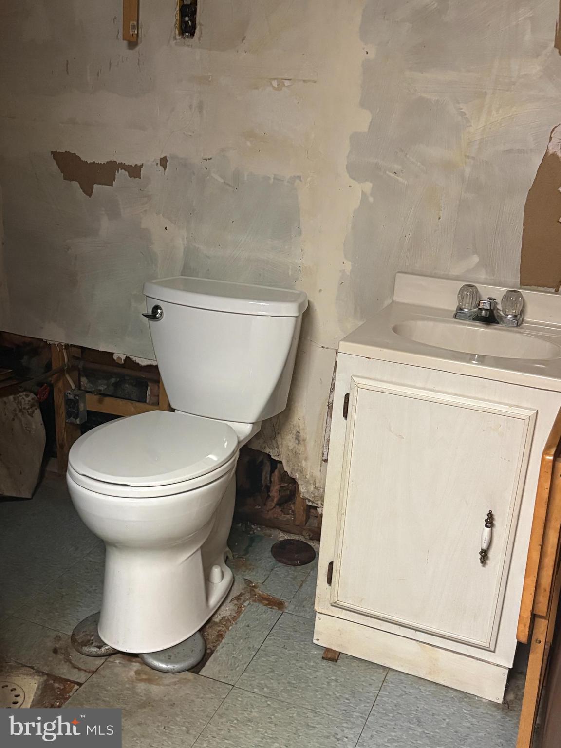 705 Winans Way Baltimore, MD 21229 - Photo 33 of 43 Bsmt half bath—ready for your vision