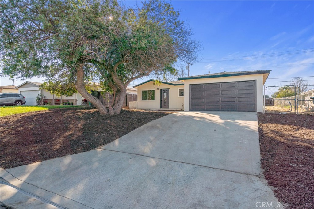 660 Arliss Street Riverside, CA 92507 - Photo 1 of 1 a view of house with outdoor space and parking