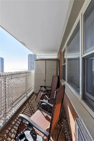 a view of workspace with wooden floor