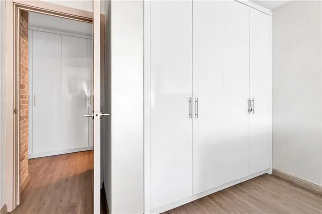 a bathroom with a sink vanity and mirror