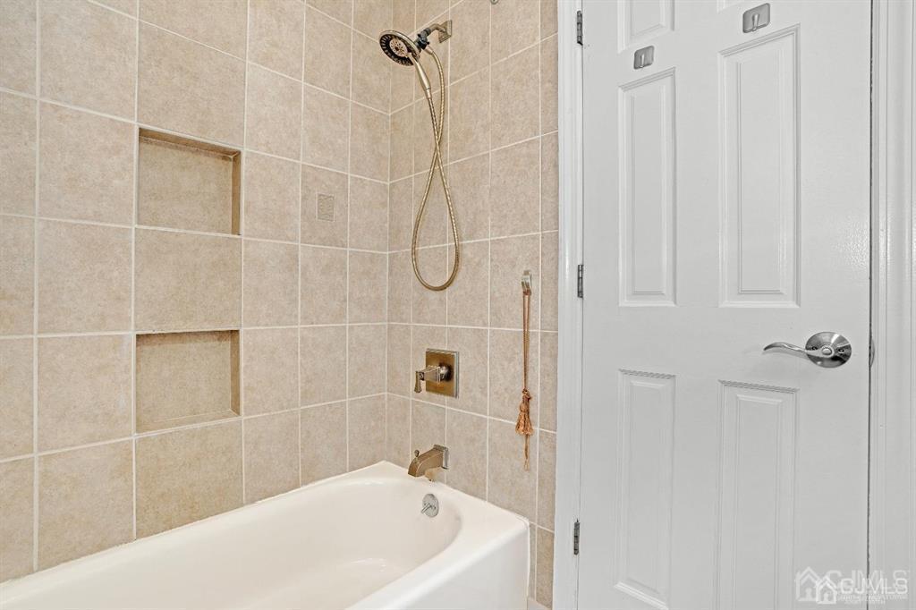 63 South Cliff Road Colonia, NJ 07067 - Photo 22 of 37 a bathroom with a bathtub