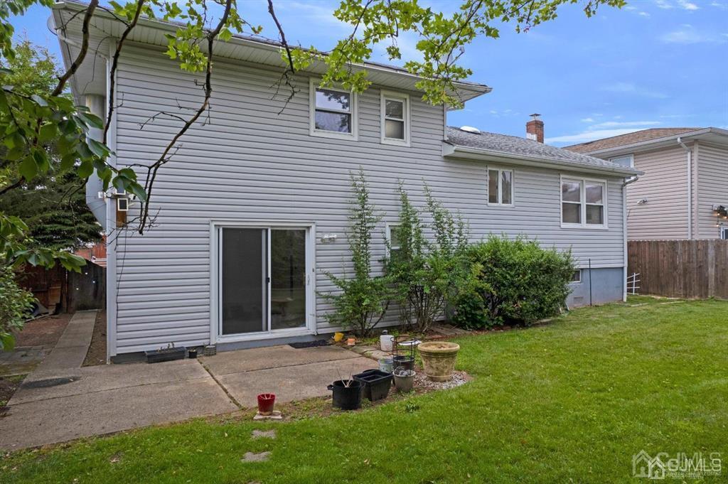 63 South Cliff Road Colonia, NJ 07067 - Photo 32 of 37 a view of a house with backyard and sitting area