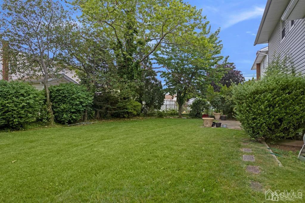 63 South Cliff Road Colonia, NJ 07067 - Photo 36 of 37 a view of an outdoor space and yard