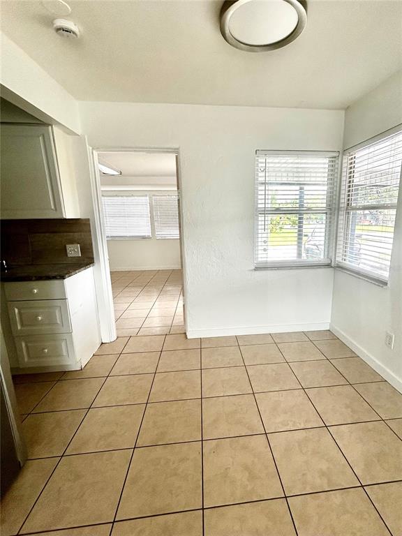 2695 Fruitville Road Sarasota, FL 34237 - Photo 4 of 13 a view of a kitchen with a sink and a stove top oven