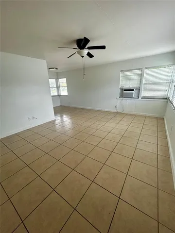a view of a room and window