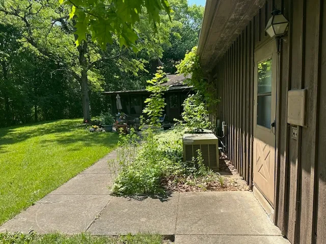 a view of a garden with pathway