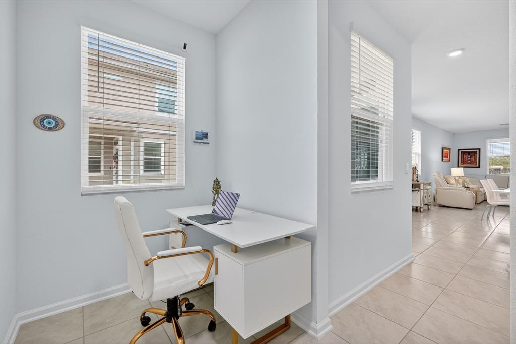 336 Redbud Road Palm Coast, FL 32137 - Photo 26 of 40 a workspace with furniture and a window