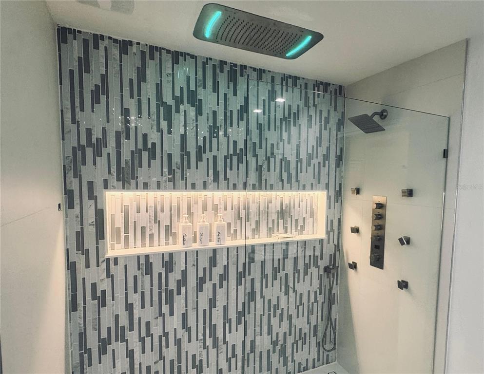 336 Redbud Road Palm Coast, FL 32137 - Photo 5 of 40 a bathroom with a shower
